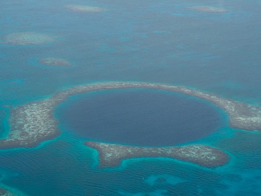 How to book a scenic flight over the Great Blue Hole in Belize
